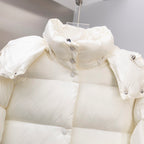 White puffer jacket hood and shoulder area with snap placket and button details