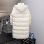 White long puffer jacket with hood, back view and horizontal quilted panels