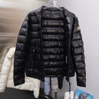 Long black puffer jacket with stand collar, quilted front, sleeve brand patch
