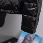 Moncler long puffer jacket, dark quilted front pocket and padded sleeve cuffs