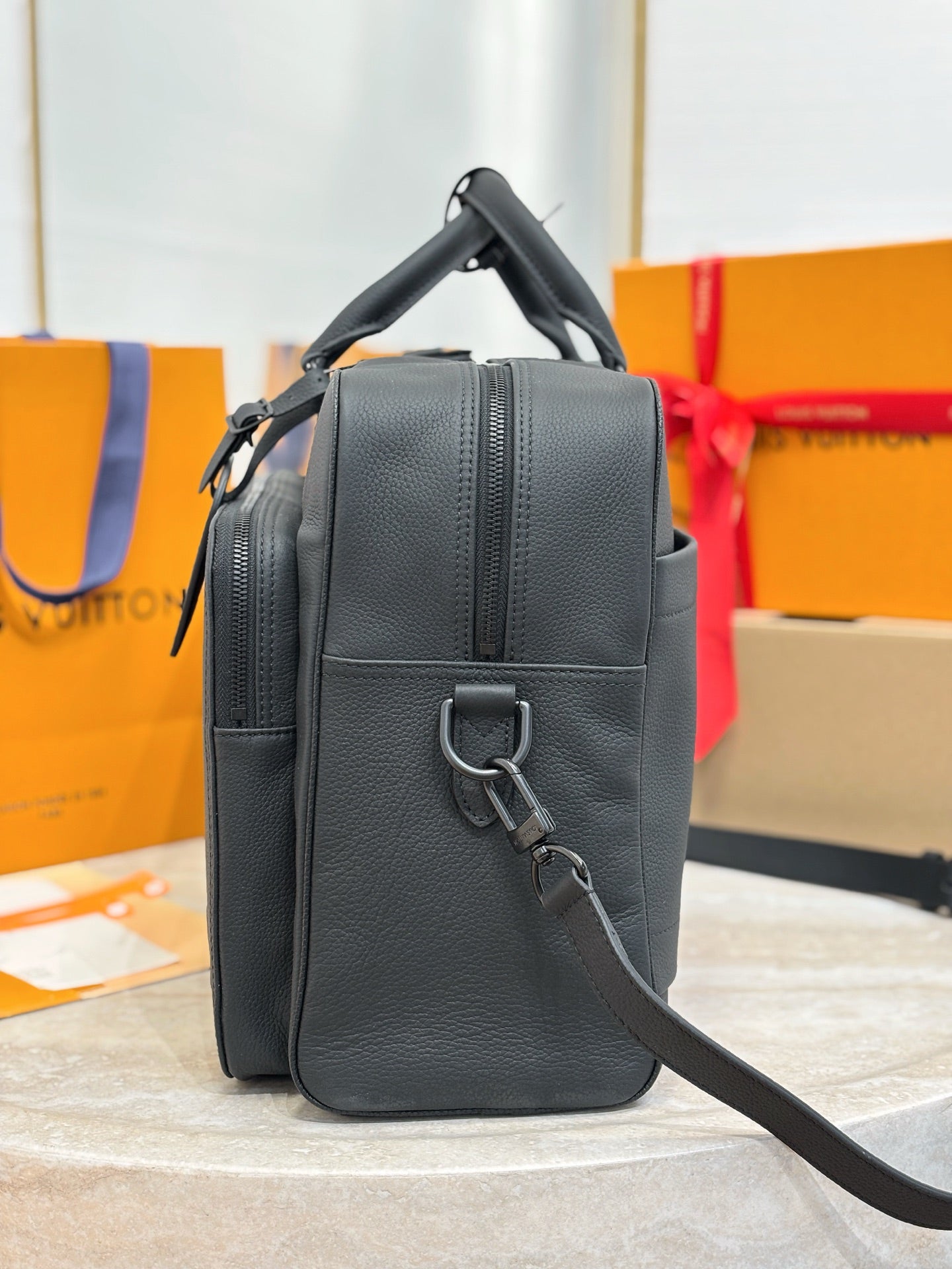 Men's crossbody briefcase bag in dark gray leather with adjustable strap