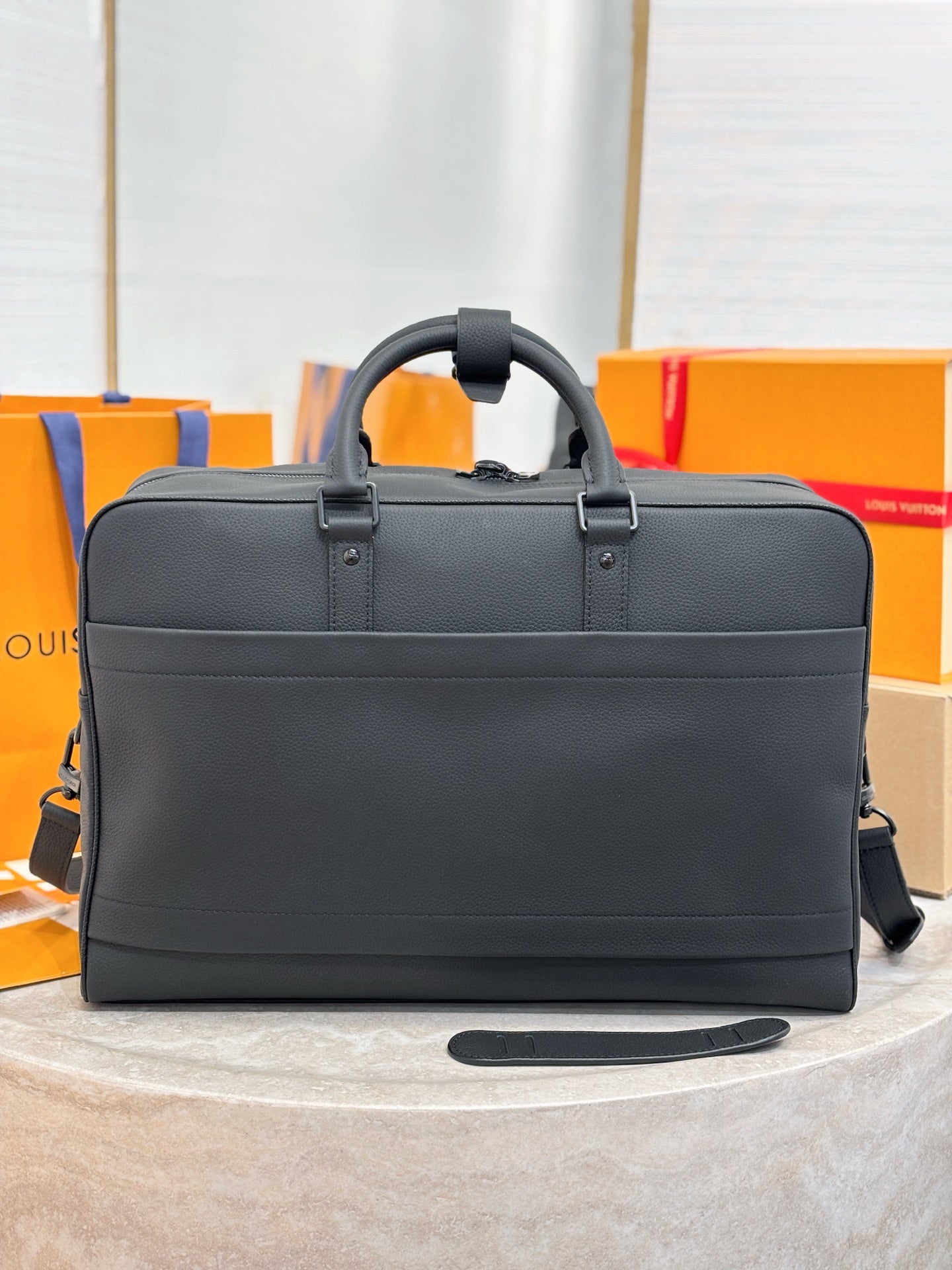 Men's briefcase bag in dark gray leather with top handles and front panels