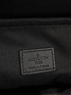 Louis Vuitton bag fabric label patch on black interior lining