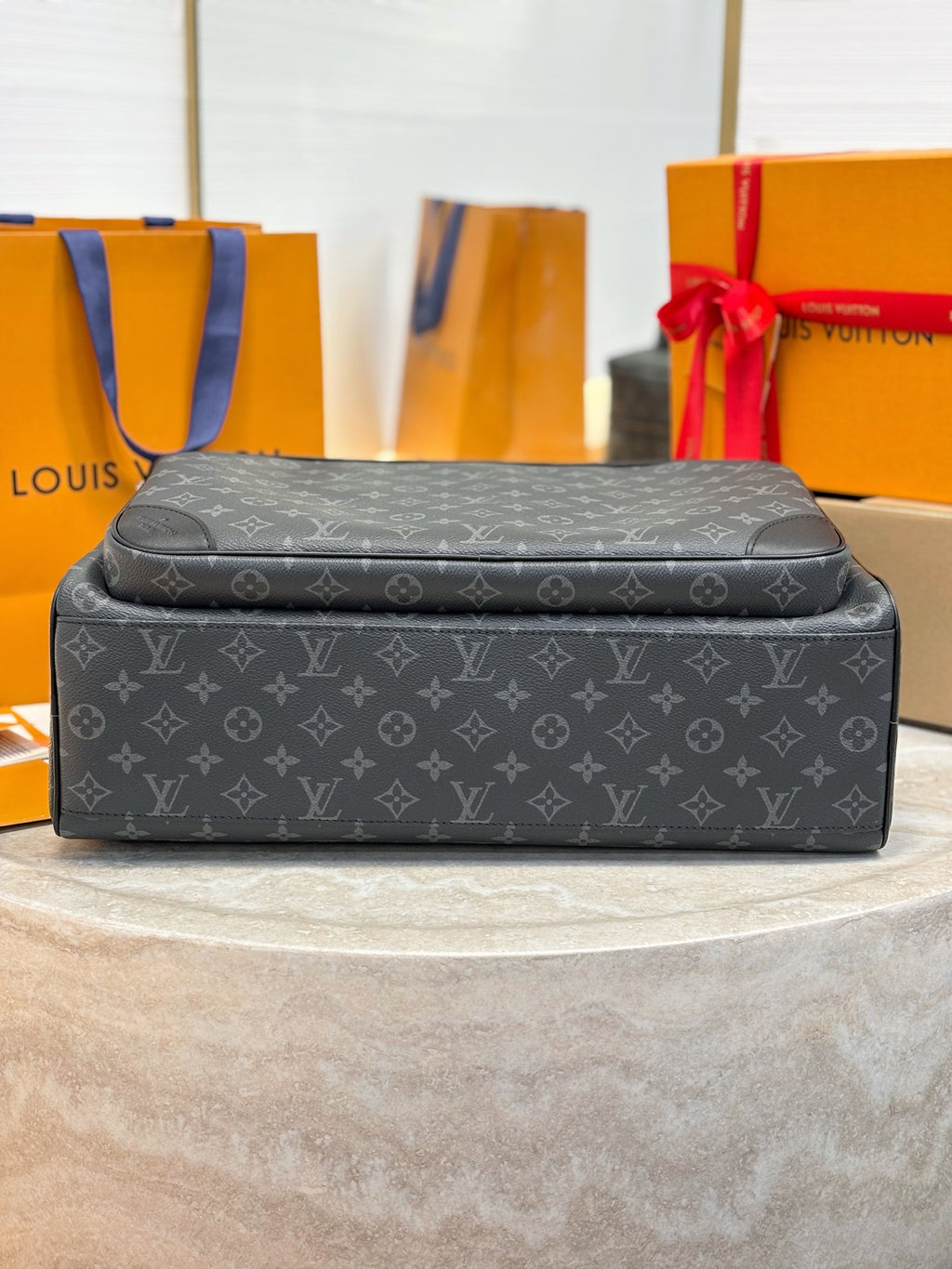 Men's Louis Vuitton monogram satchel bag with flap top and smooth front panel