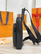 Louis Vuitton black leather mini bag with zip top and shoulder straps