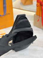 Louis Vuitton black leather bag opening with zipper track and pull tab