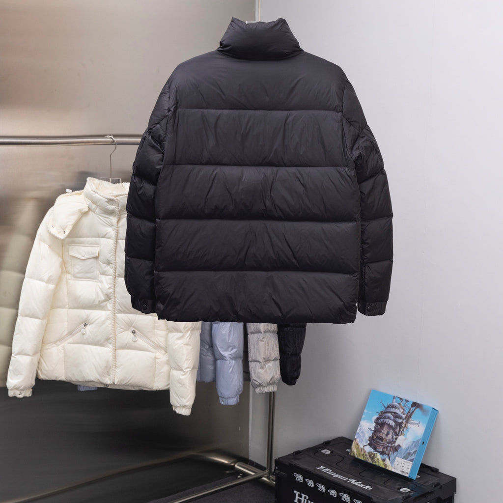 Dark long puffer jacket with stand collar and quilted horizontal baffles