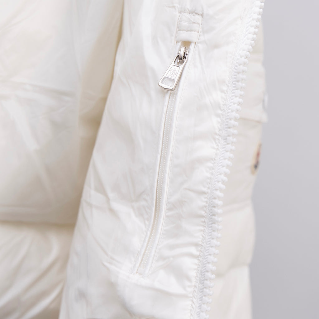White Moncler puffer jacket front zipper and textured seam stitching