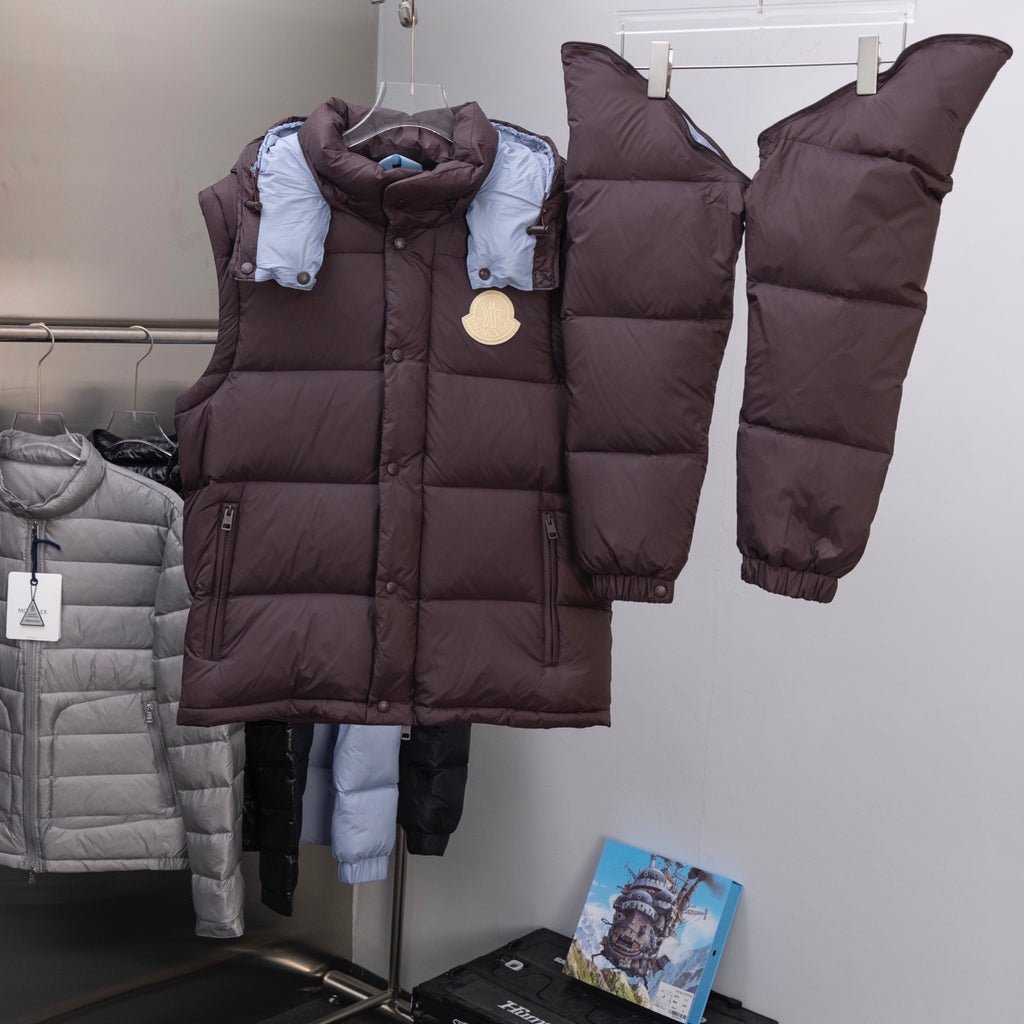 Moncler long puffer coat front, dark brown with blue collar lining and logo emblem