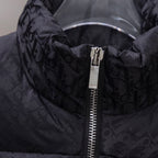 Black Dior puffer jacket hood area with metal zipper and logo texture.