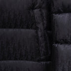 Black Dior puffer jacket front with zipper and monogram pattern close-up.