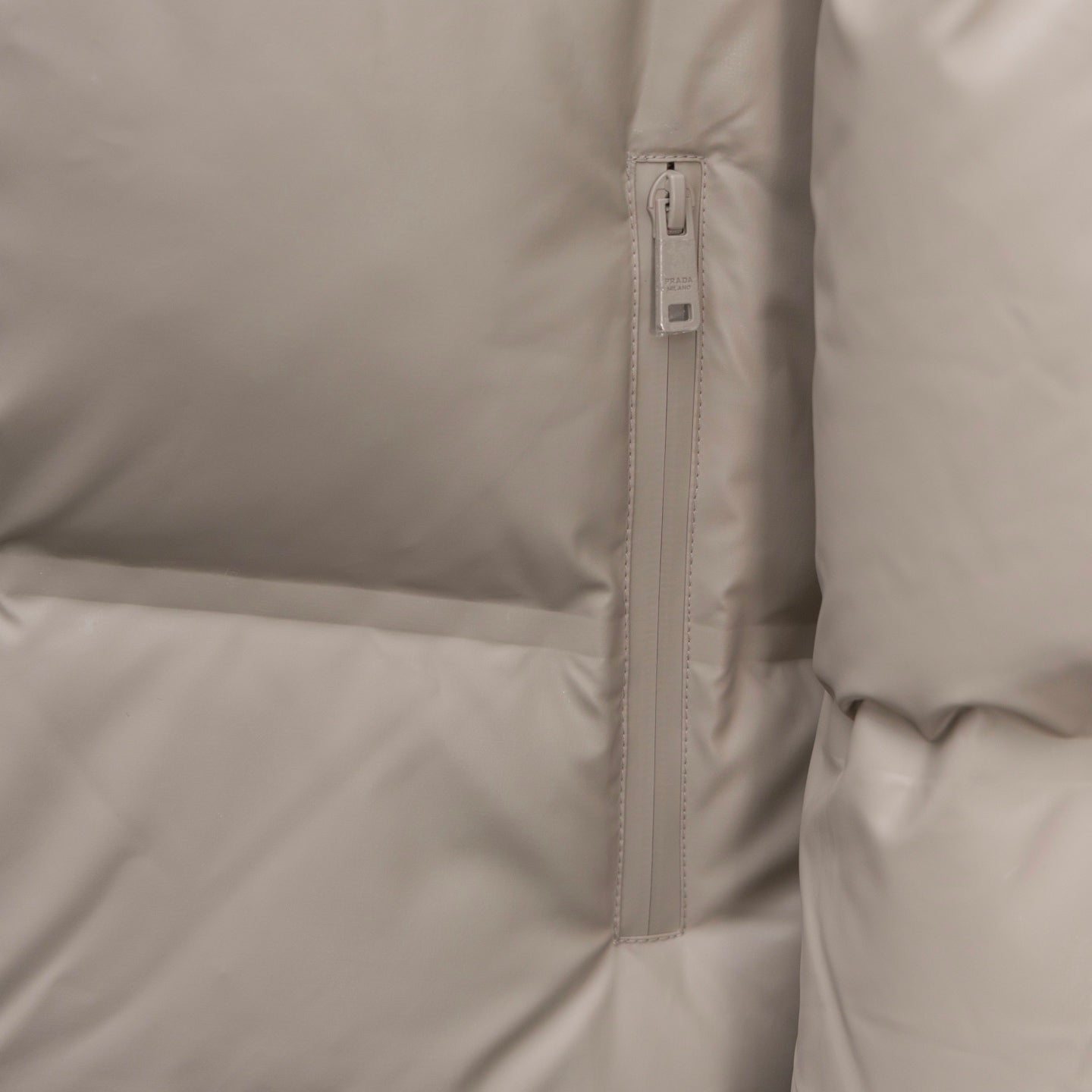 Prada long coat in light beige, front zipper and quilting detail