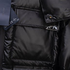 Long puffer jacket chest pocket with Prada-stamped metal tab