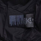 Long puffer jacket interior care label with Prada and size tag