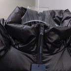 Long puffer jacket, dark with front zipper and quilted panels