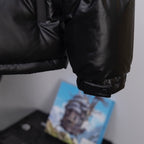 Prada long padded jacket, dark, buttoned cuff with adjustable strap detail