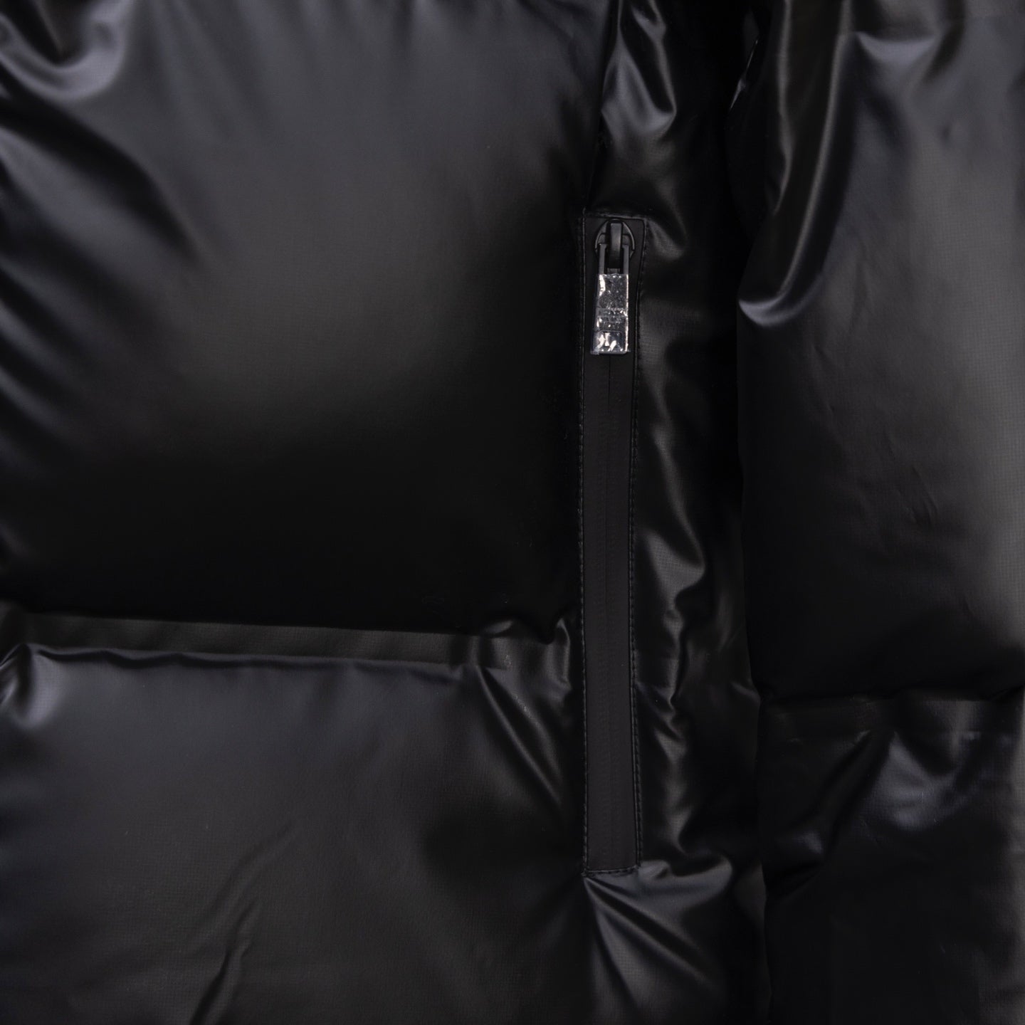 Prada long padded jacket, dark, front zipper and elastic waist hem