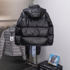 Long puffer jacket, dark with hood and stitched back panels