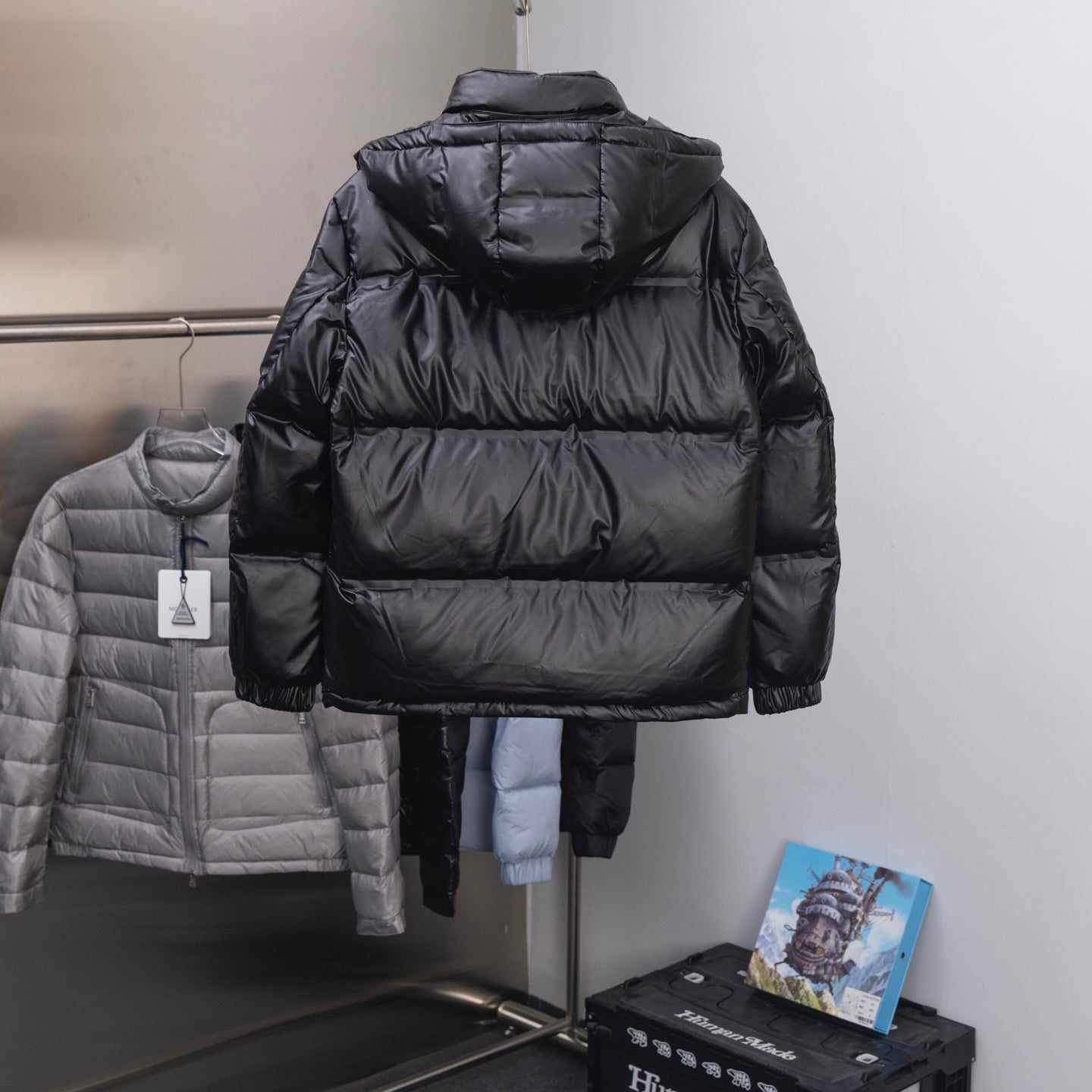 Long puffer jacket, dark with hood and stitched back panels