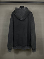 Balenciaga dark zip-up hoodie with hood, back view, ribbed cuffs