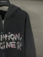 Balenciaga dark zip-up hoodie side view with 'Fashion' graphic on chest