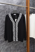 Dior long cardigan, black V-neck with white patterned trim and button placket