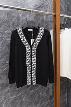 Dior long cardigan, black V-neck with white patterned trim and button placket