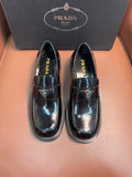Prada unisex leather loafers, dark glossy finish, buckle strap, low stacked sole