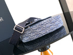 Dior men's crossbody bag front detail, blue monogram flap with buckle strap