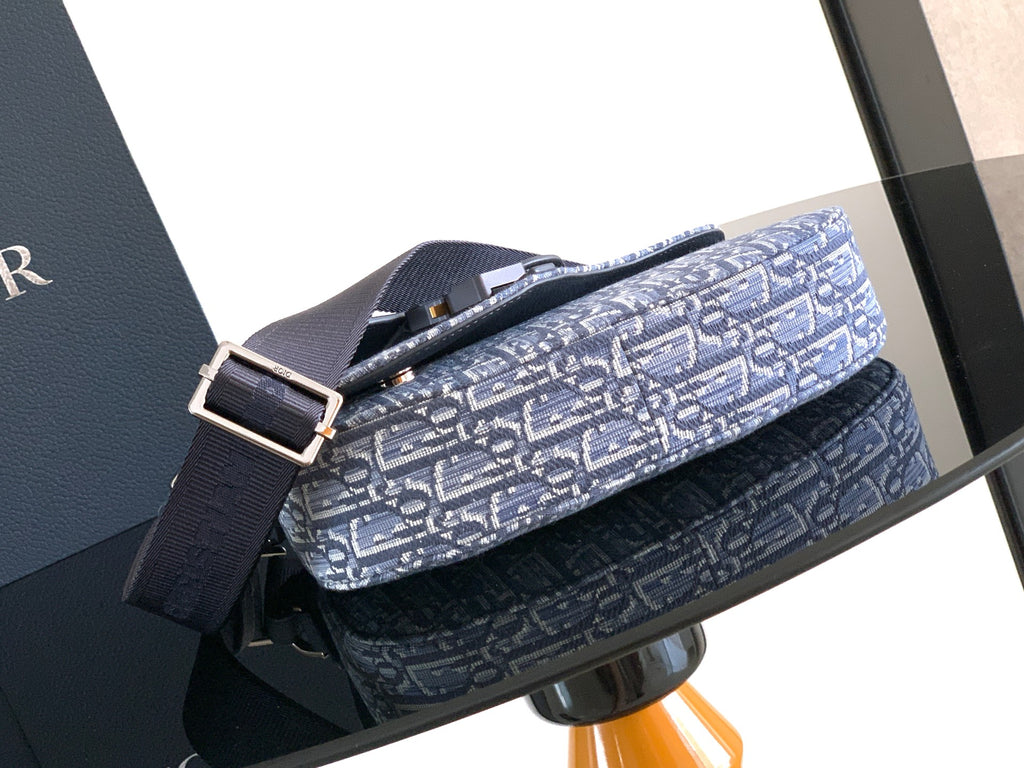 Dior crossbody bag with adjustable strap and fold-over flap, blue monogram pattern