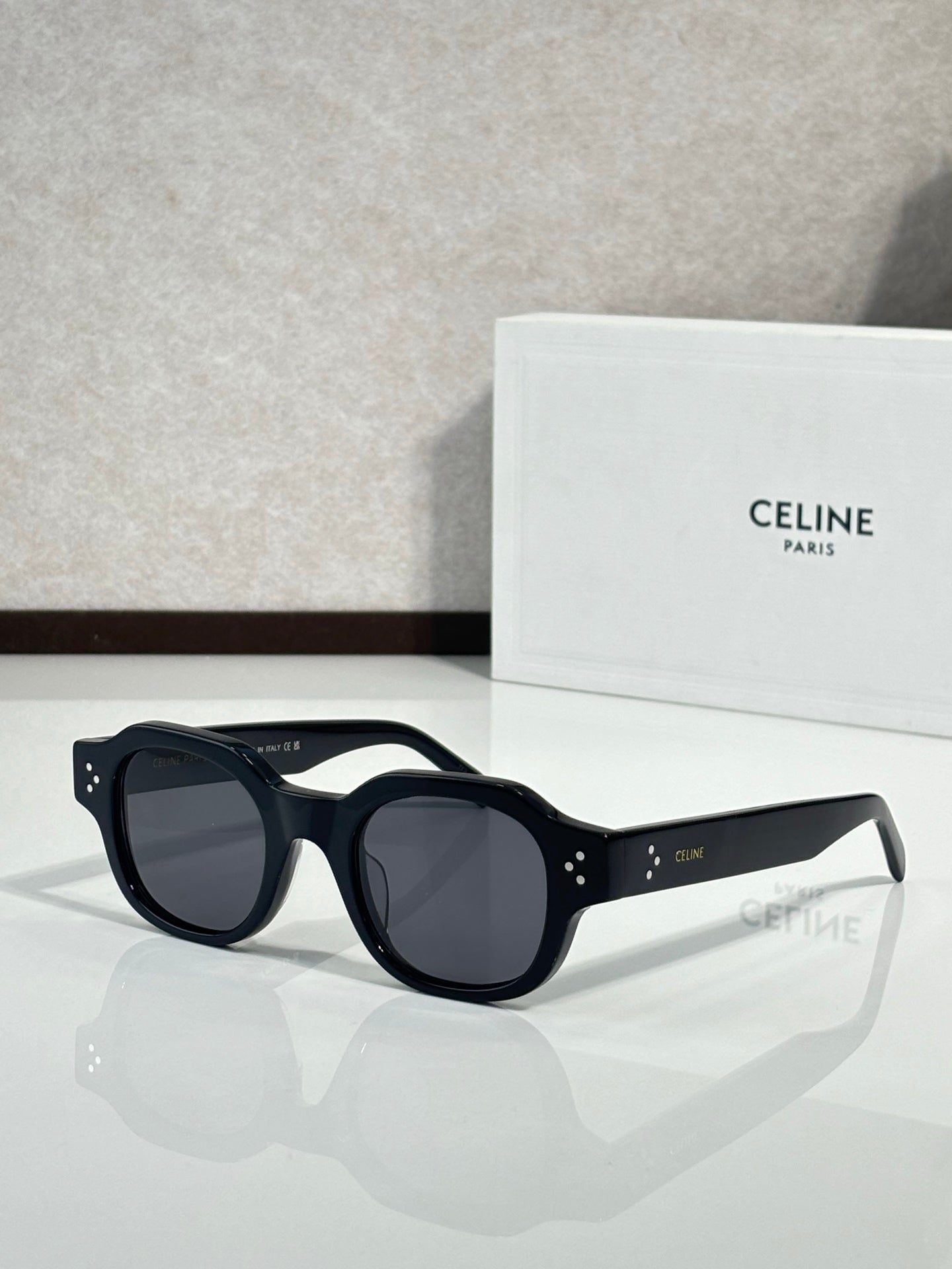 Celine sunglasses with dark navy frame and dark lenses