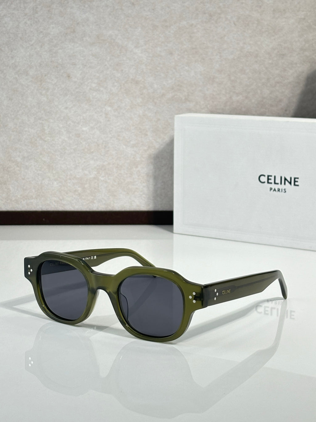 Celine sunglasses with olive green frame and dark lenses