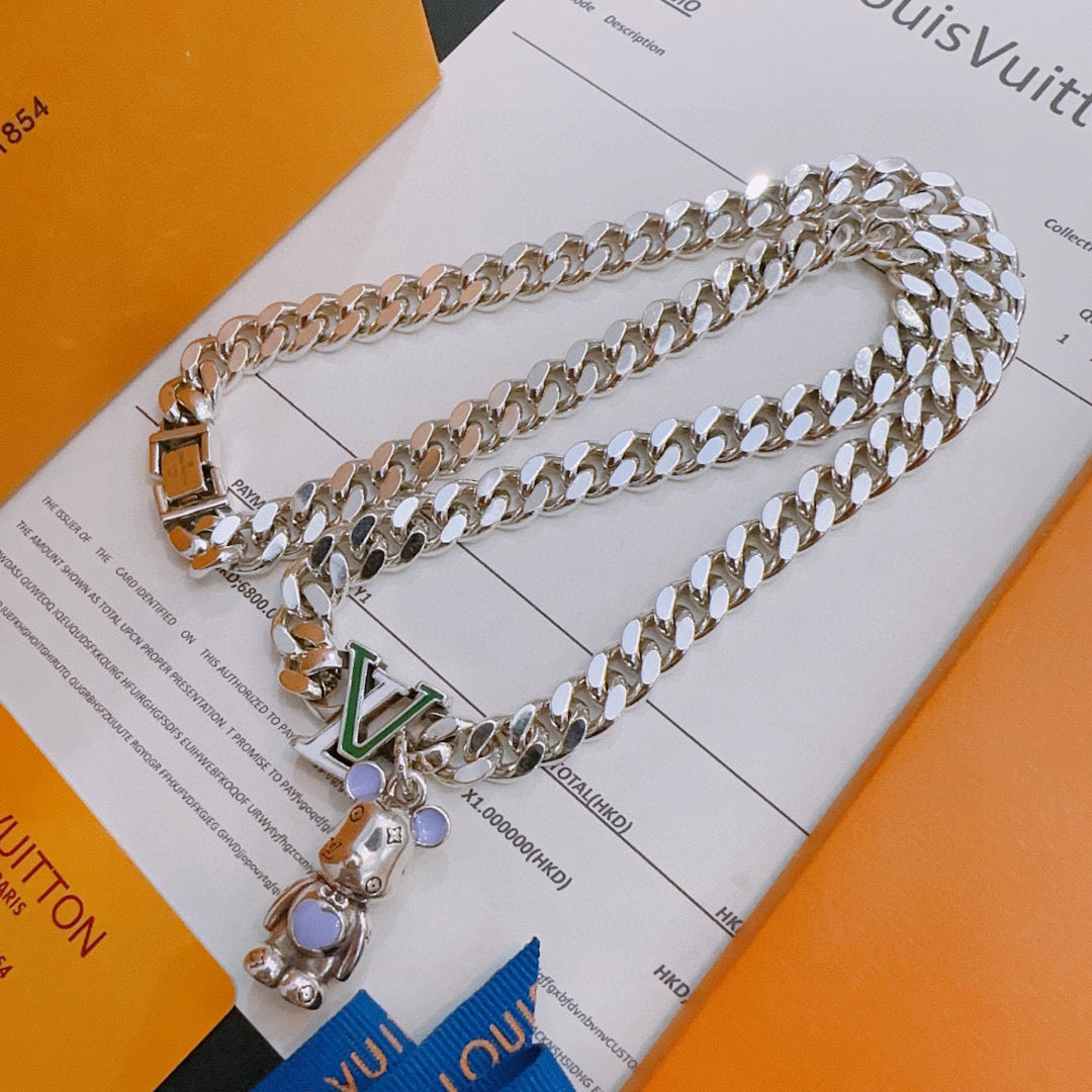 Louis Vuitton silver chain necklace with multicharm pendant and purple stone accents