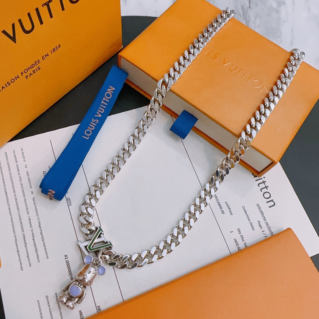 Louis Vuitton silver chain necklace with bear and charm pendant, purple accents