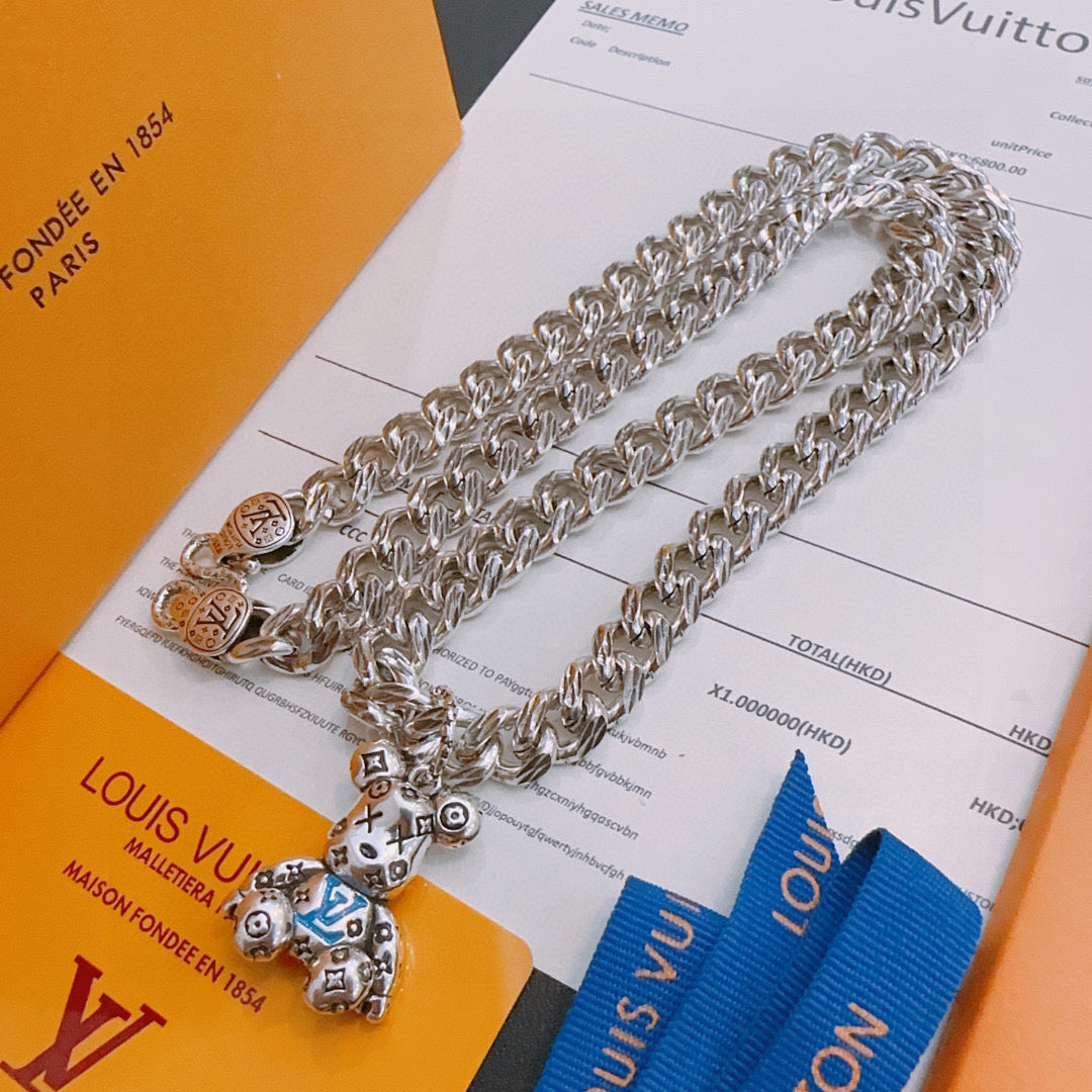 Louis Vuitton silver chain necklace with charm pendant, on card with blue insert