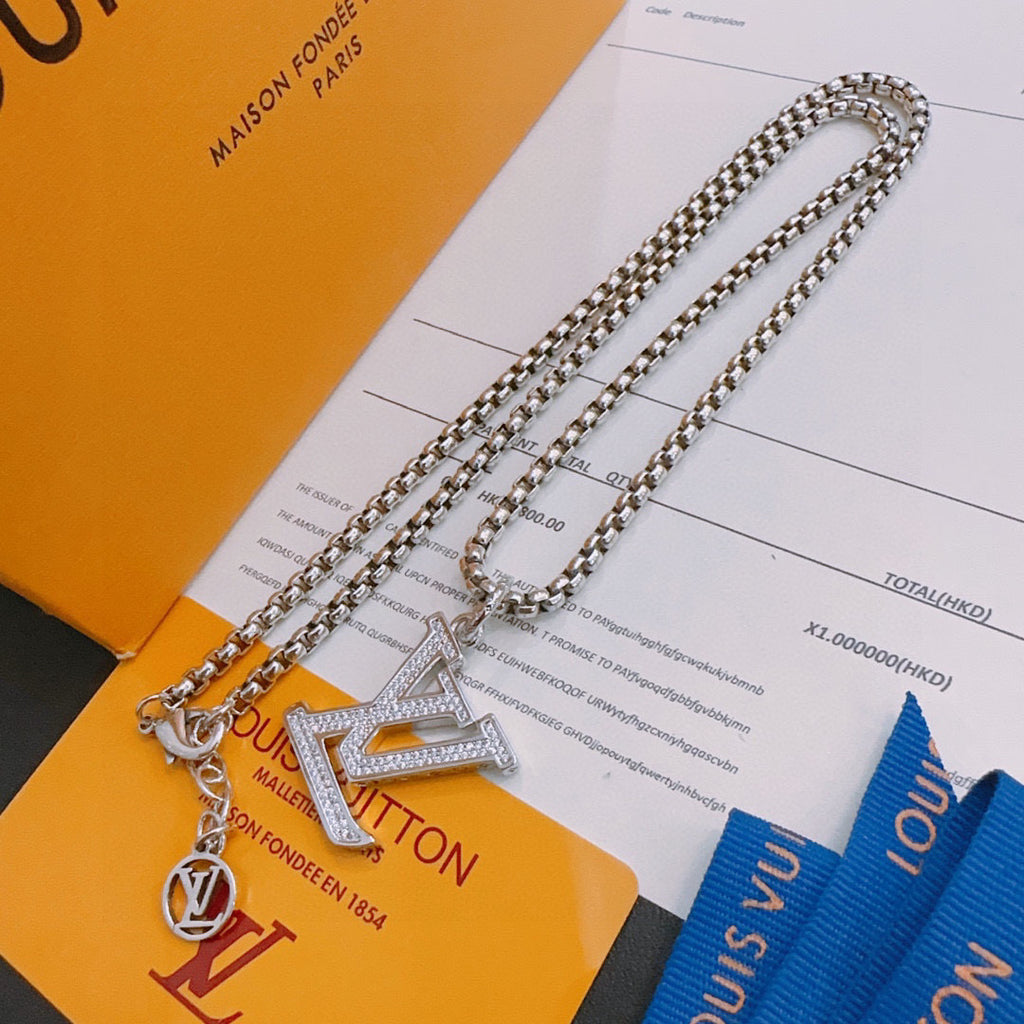 Silver-tone layered chain necklace with LV pendant and small charm pendants