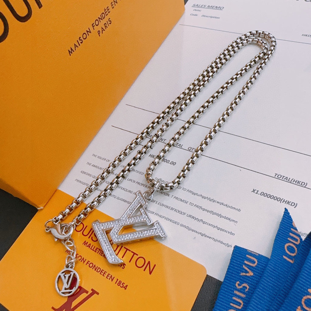 Silver-tone layered chain necklace with LV pendant and round charm