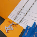 Silver-tone chain necklace with LV monogram pendant charm