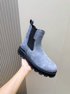 Moncler suede Chelsea boot with elastic side panels and dark rubber sole, 3/4 view
