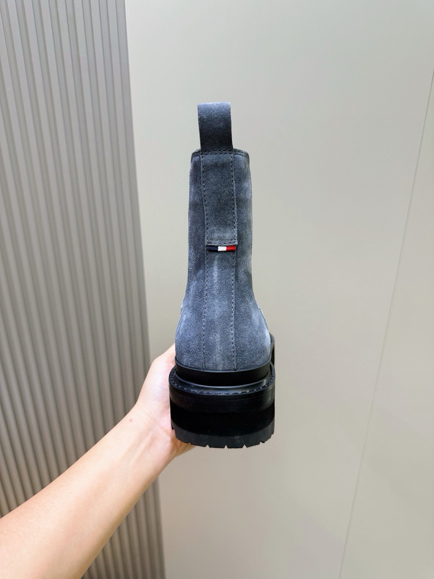 Moncler suede Chelsea boot back view with elastic gore and dark rubber sole