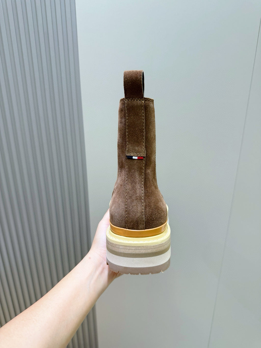 Moncler brown suede Chelsea boot back view, heel tab and stacked rubber sole