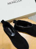 Moncler black suede Chelsea boots with MONCLER logo on upper