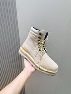 Beige suede lace-up ankle boot with tonal laces and chunky tread sole