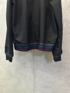 Long-sleeve jacket back lower, dark with multicolor striped ribbed hem and cuffs
