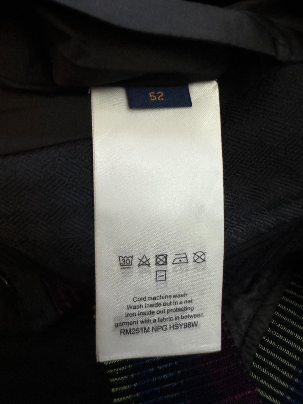 Care label: cold machine wash, wash inside out, remove before ironing