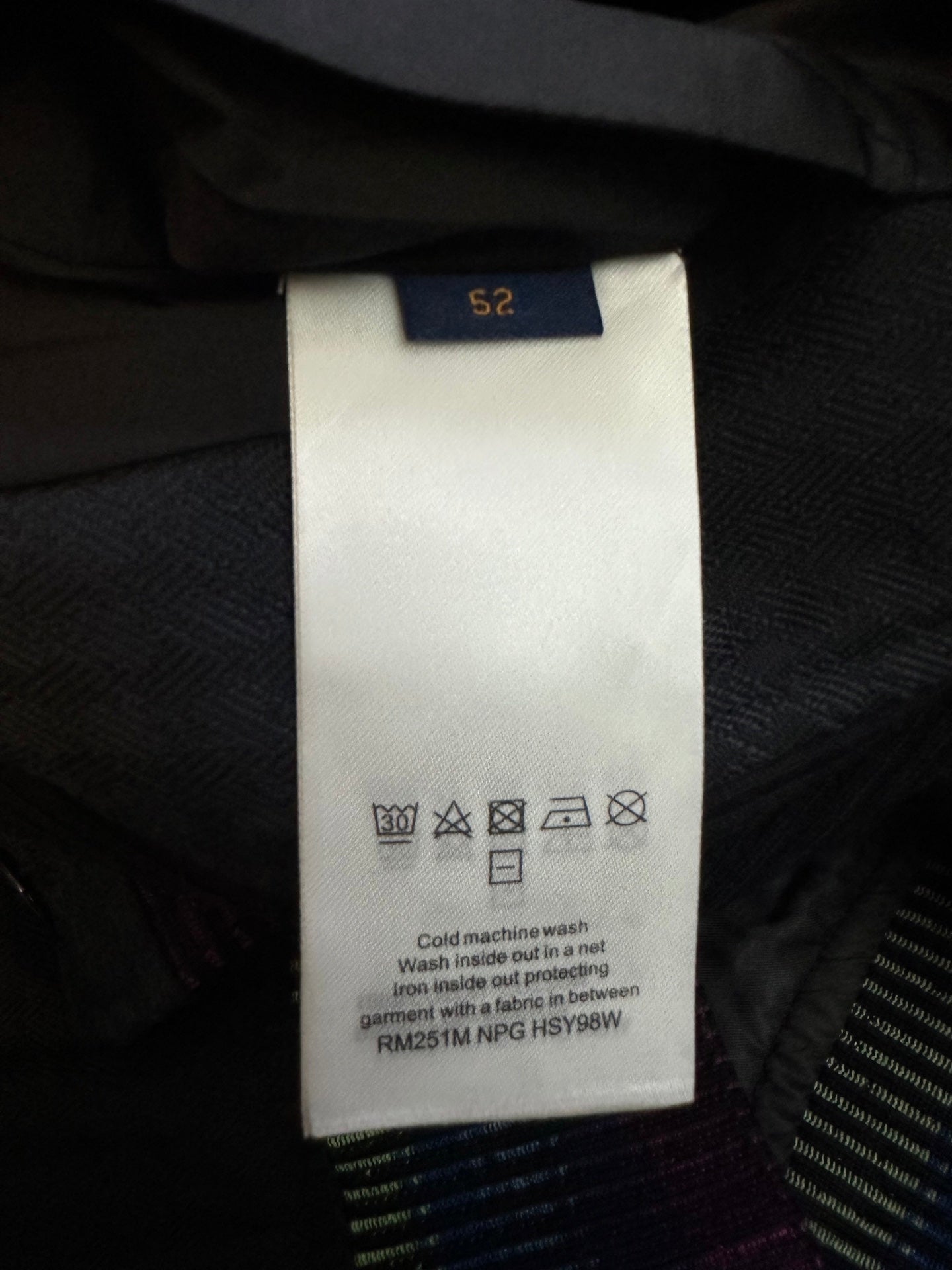 Care label: cold machine wash, wash inside out, remove before ironing