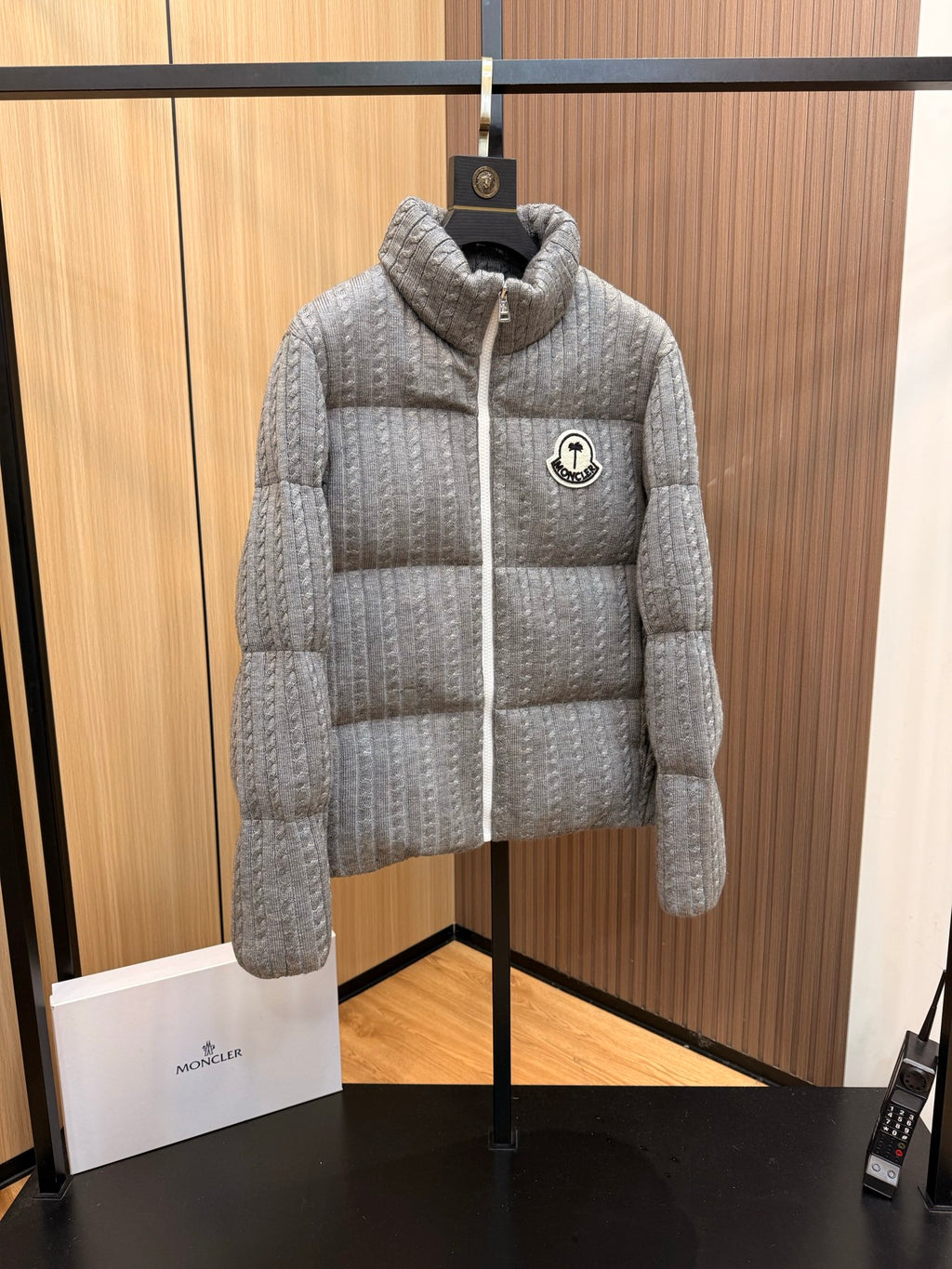 Moncler long quilted puffer jacket, light gray, front zip and raised collar detail