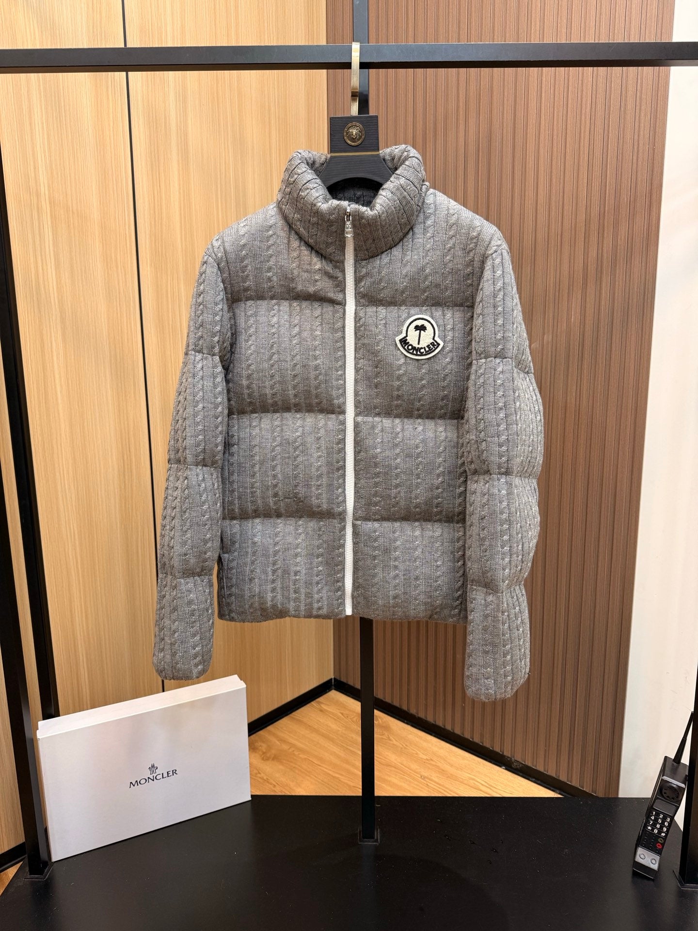 Moncler long quilted puffer jacket, light gray, full-zip with chest logo patch
