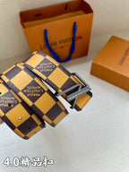 Louis Vuitton Damier check belt buckle with patterned strap and engraved branding