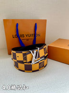 Louis Vuitton Damier check belt featuring a gold buckle on a dark-and-yellow strap